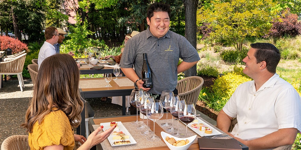 People being served wine
