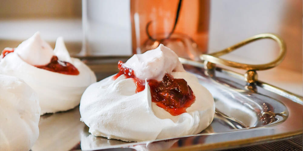 Pavlova With Rhubarb & Vanilla Compote With Strawberry Whipped Cream