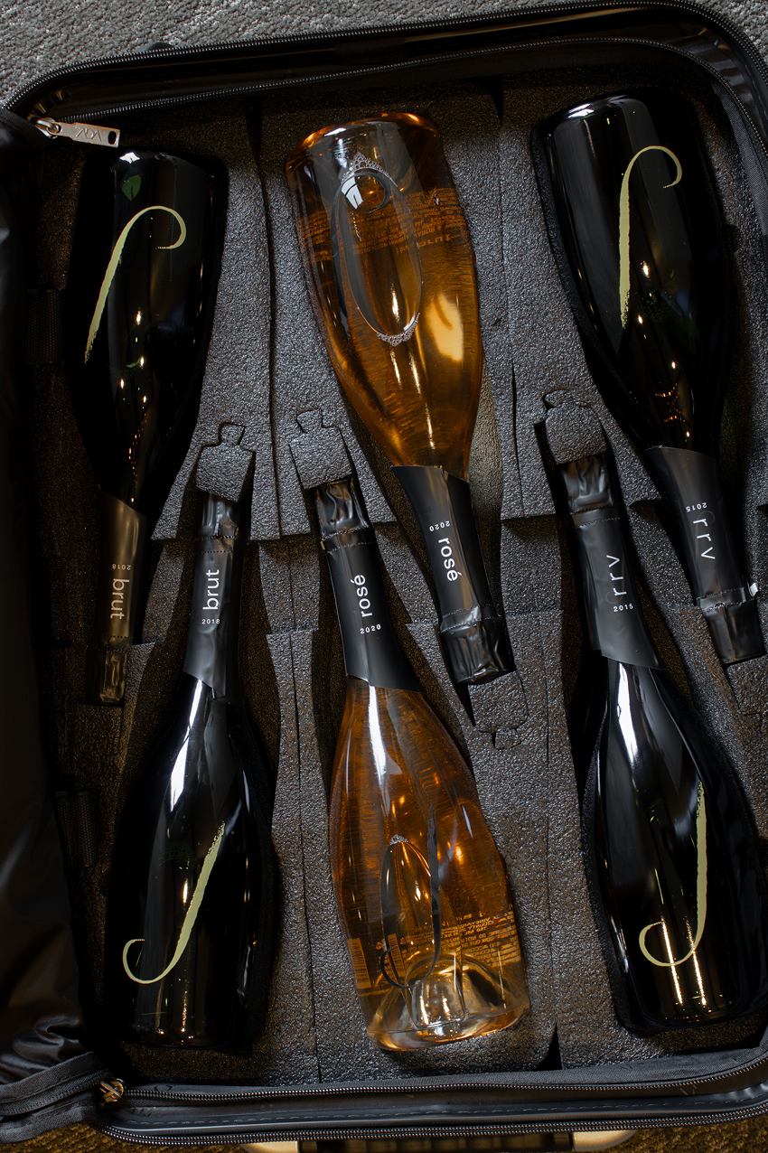 Sparkling wine and Suitcase travel bundle